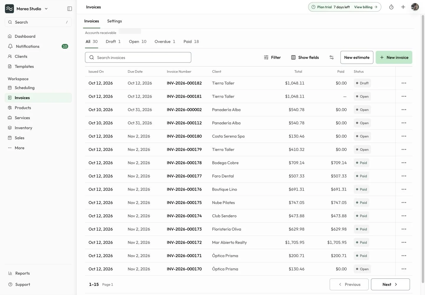 Mantuno invoice register showing invoice status, client names, balances, and invoicing actions in the English workspace.